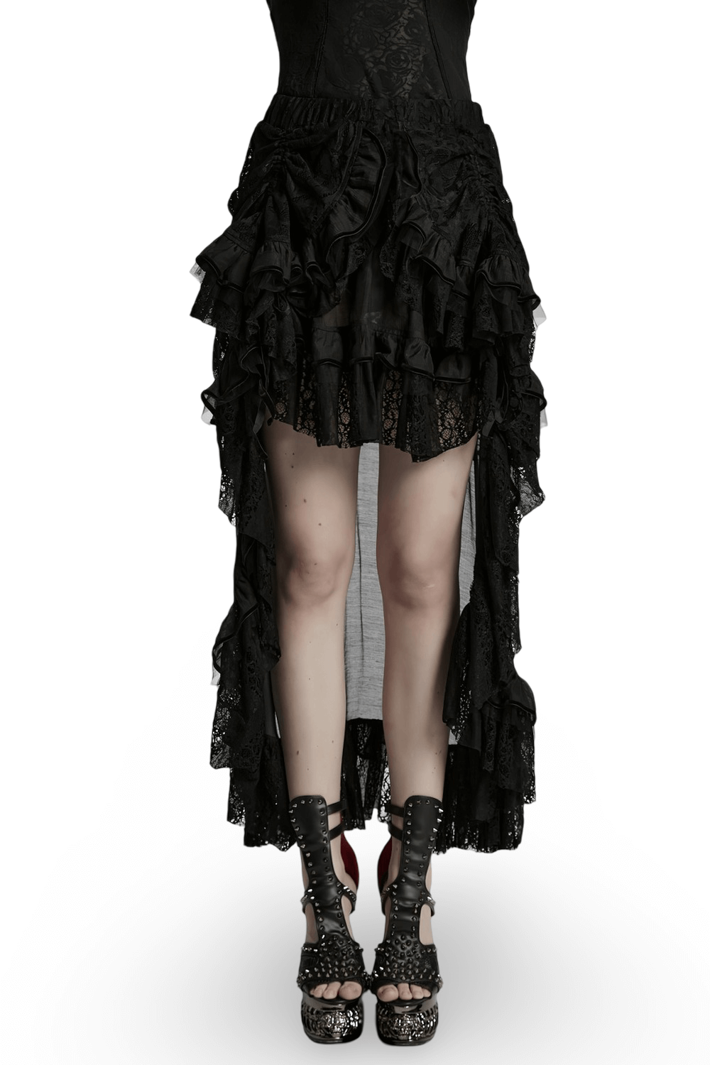 Gothic high-low skirt with ruffled lace and chiffon mesh, styled with edgy platform boots.