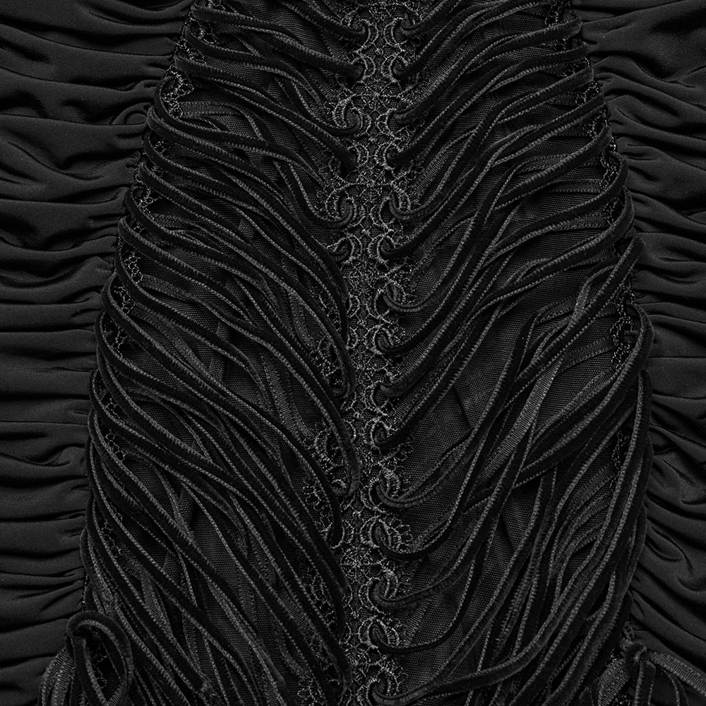 Close-up of black lace detailing with intricate drawstring design on gothic long skirt.