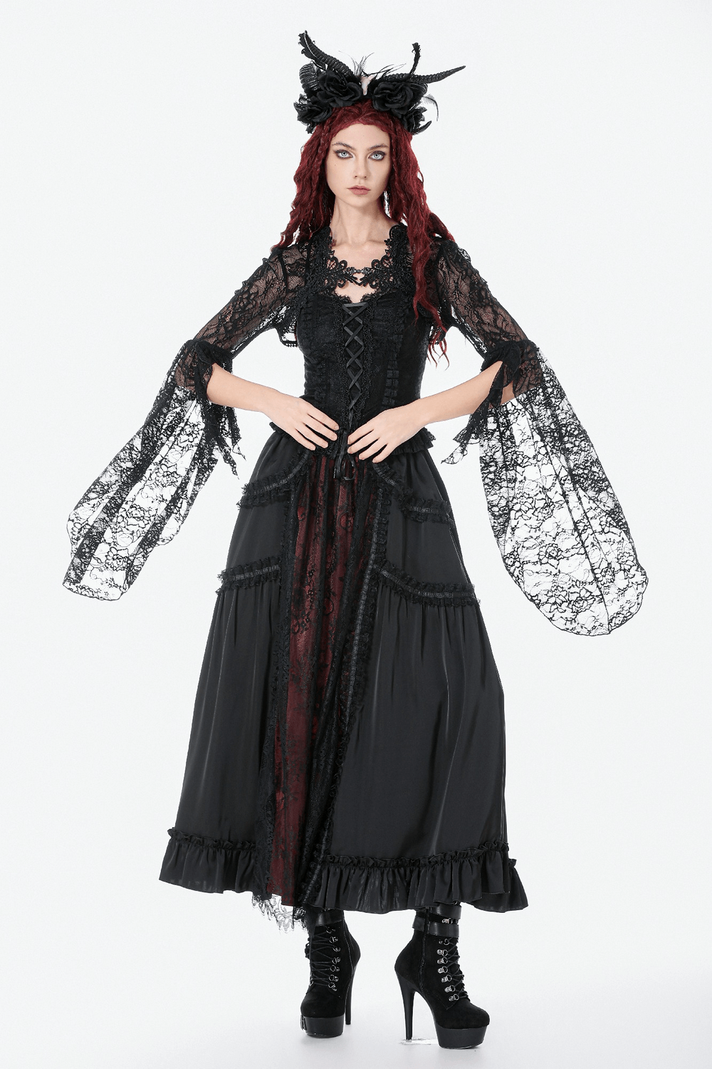 Gothic Lace Shrug Bolero with Dramatic Bell Sleeves worn over a black long dress, featuring sheer lace and dramatic sleeves.