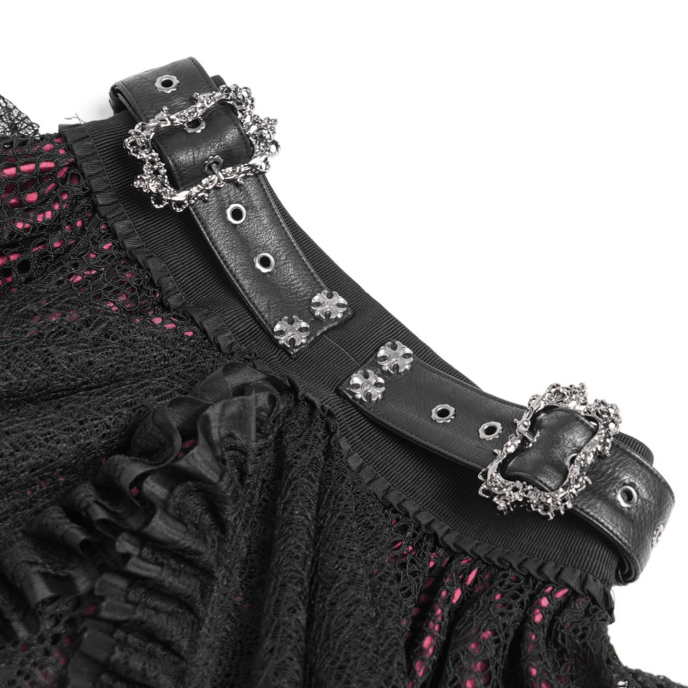 Close-up of the ornate belt with buckles on a gothic lace skirt, featuring black ruffles and intricate lace.