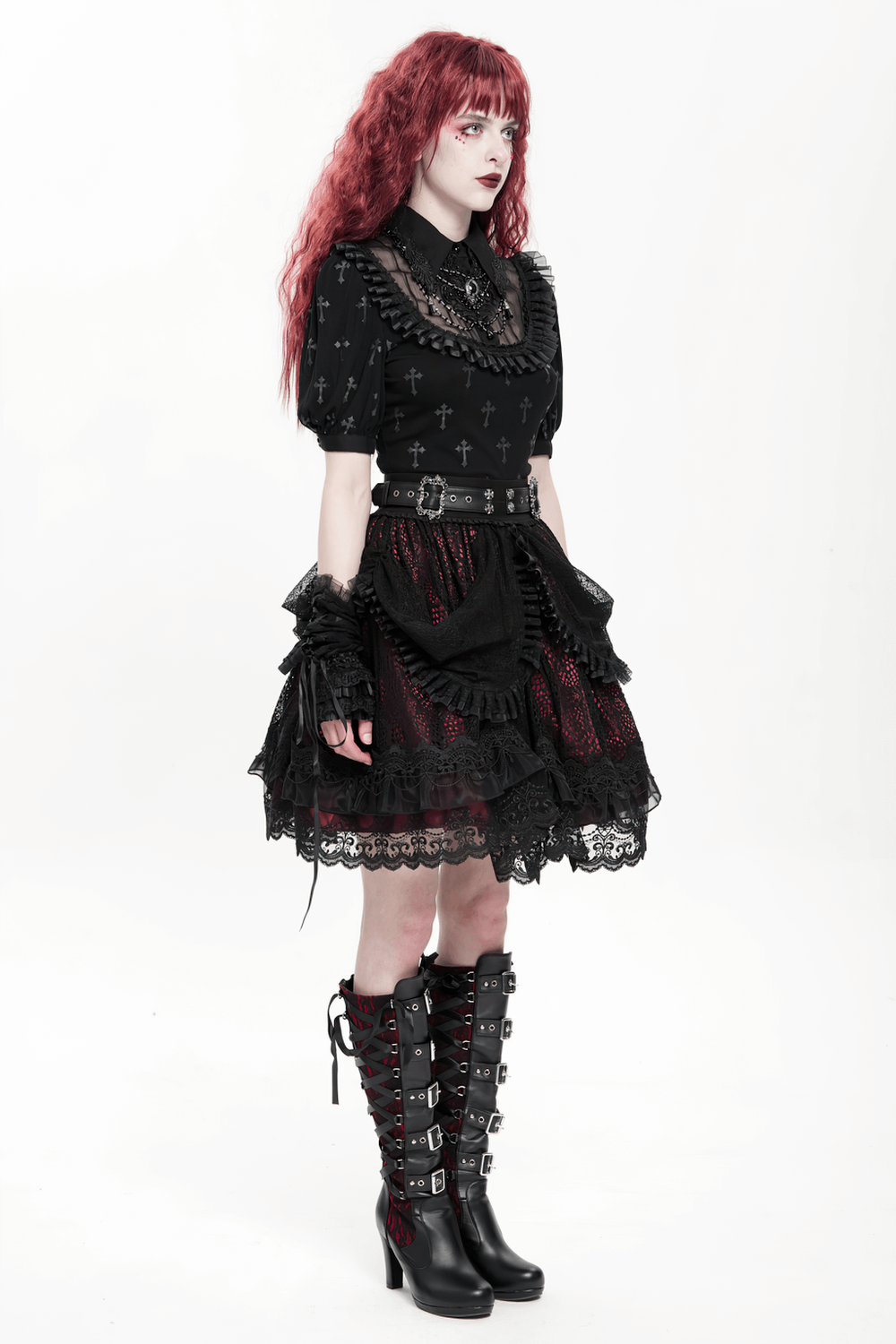 Gothic lace skirt with layered black ruffles, red underlayer, and ornate belt in Victorian style.