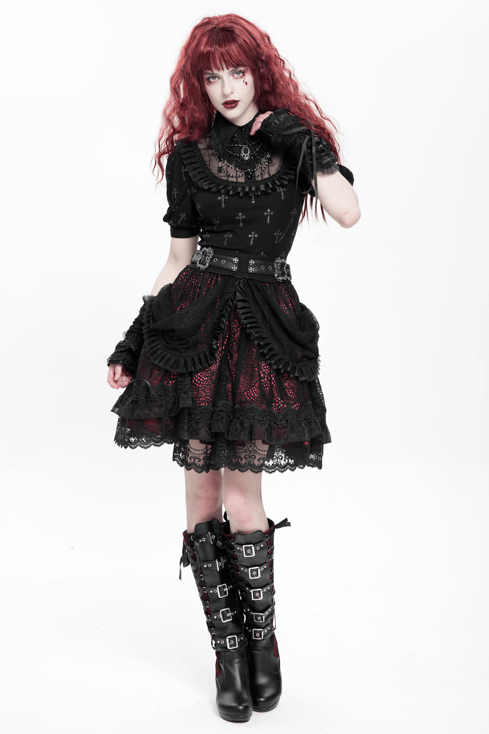 Gothic lace skirt with black ruffles, layered design, and ornate belt in Victorian-inspired outfit.