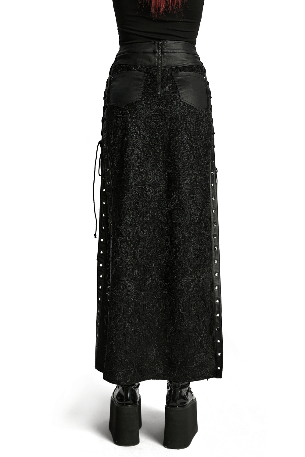 Gothic lace skirt with buckle detail, side slits, and eyelet drawstring for a bold, rebellious look.