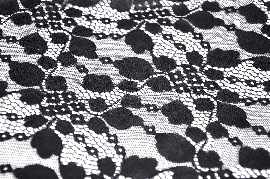 Close-up of intricate black lace fabric with floral design, perfect for gothic and alternative fashion styles.