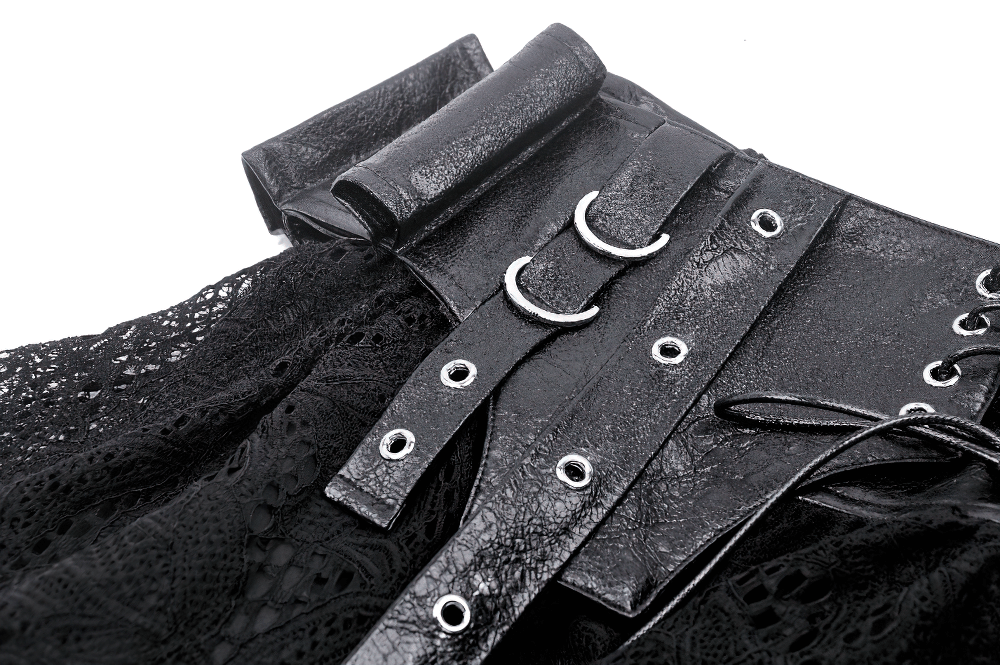 Close-up of gothic lace skirt featuring faux leather corset with adjustable lacing and metal accents.