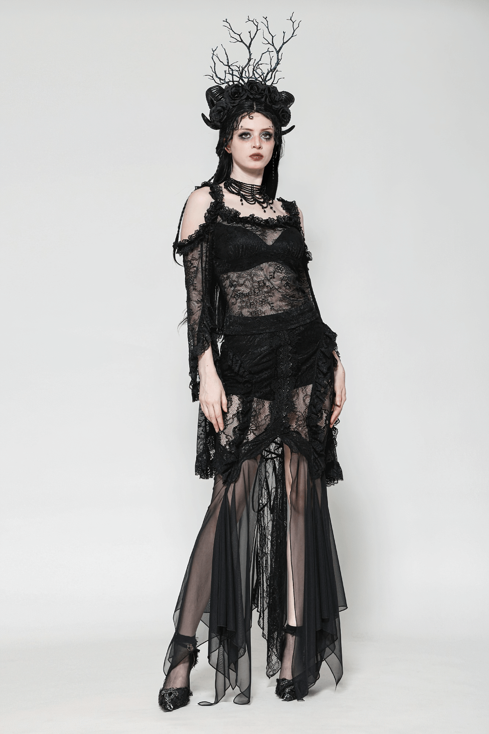 Gothic lace skirt with sheer mesh, high-low hem, and dramatic lace panels for dark Victorian elegance.