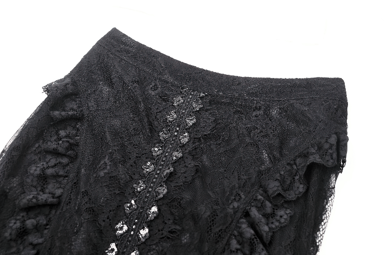 Close-up of a Gothic lace skirt with intricate panels and a flowing design, perfect for alternative fashion.