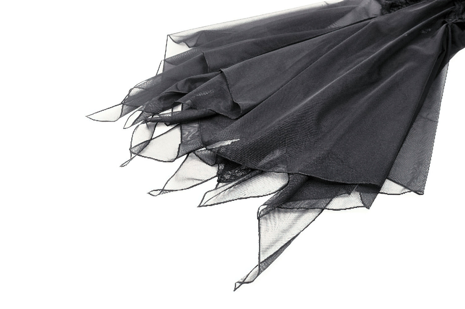 Close-up of sheer black mesh fabric creating a dramatic high-low hem, perfect for gothic elegance.