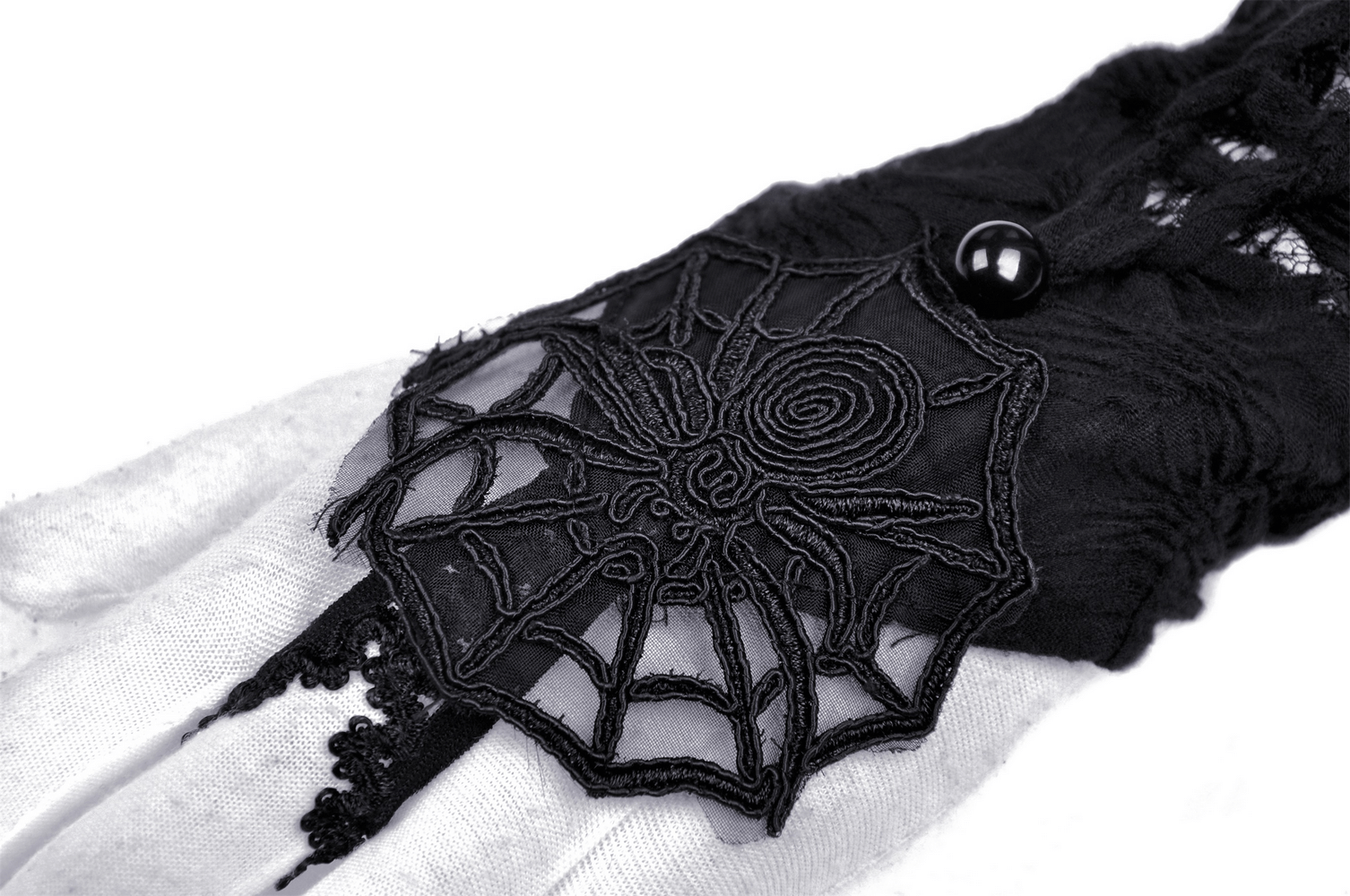 Gothic Lace Spiderweb Fingerless Gloves for Women with intricate spiderweb embroidery and button detail.