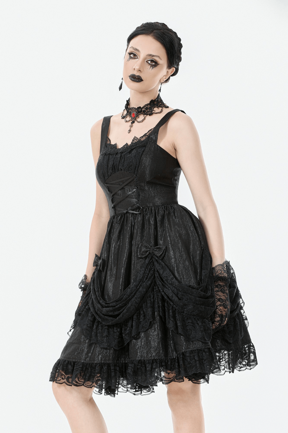 Gothic Lace Strap Dress with Ruffled Detailing and Lace Trim worn by a model, showcasing dark romance and elegance.