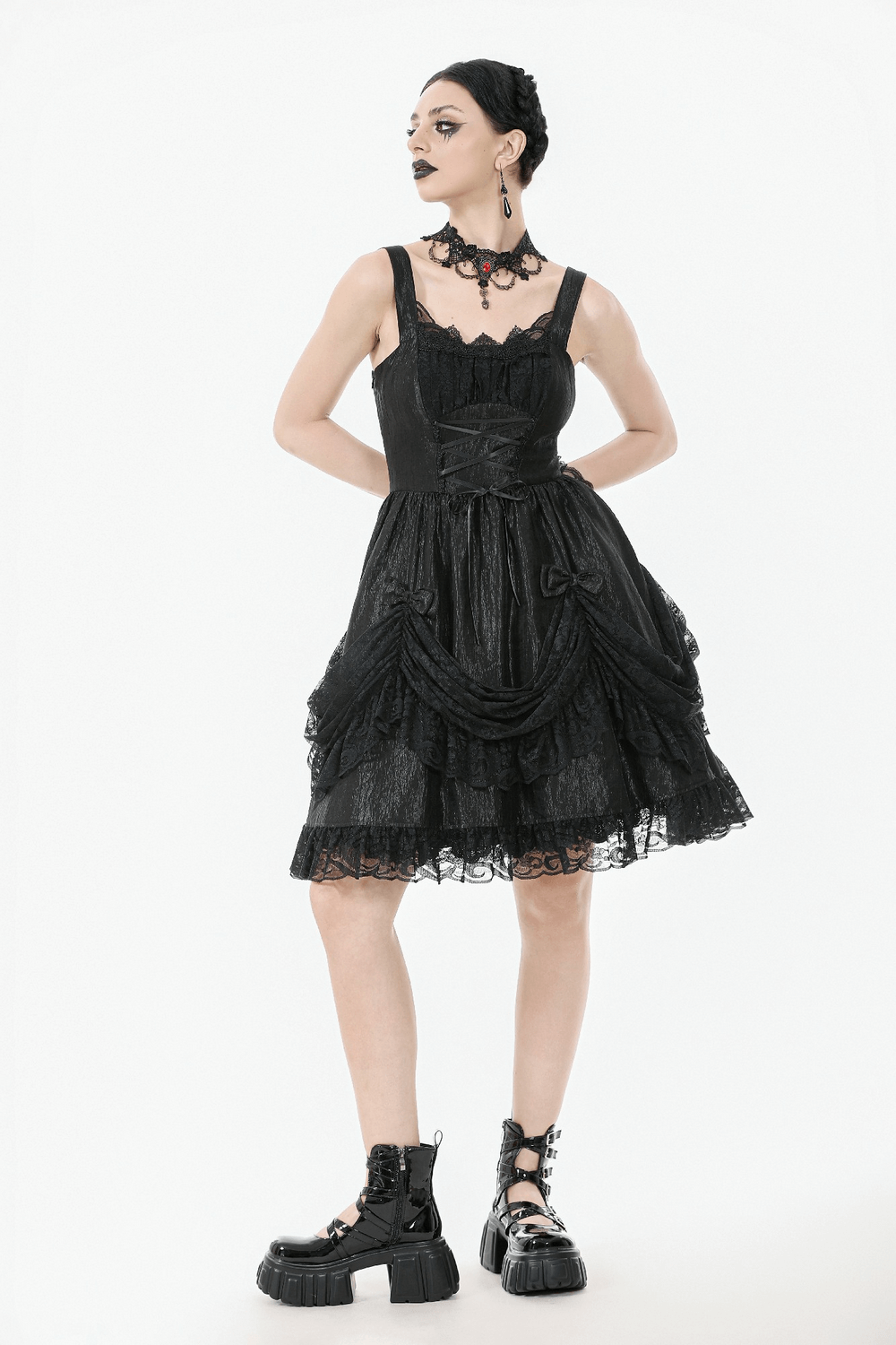 Gothic Lace Strap Dress with Ruffled Detailing and Lace Trim worn by model in black shoes, showcasing its vintage charm.