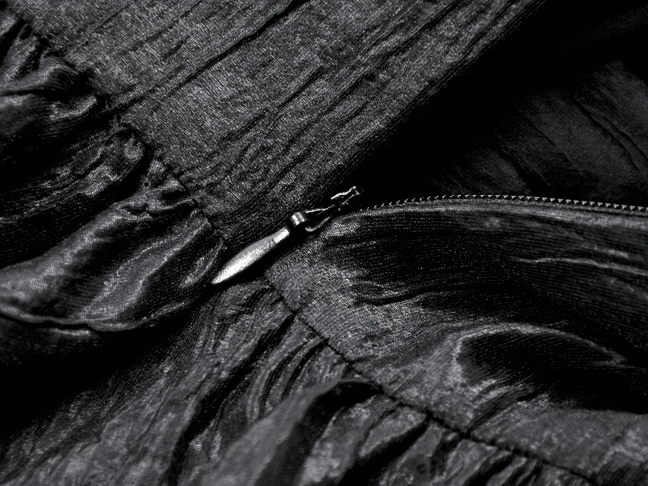 Gothic Lace Strap Dress with Ruffled Detailing and Lace Trim close-up showing zipper and ruffled fabric detail.