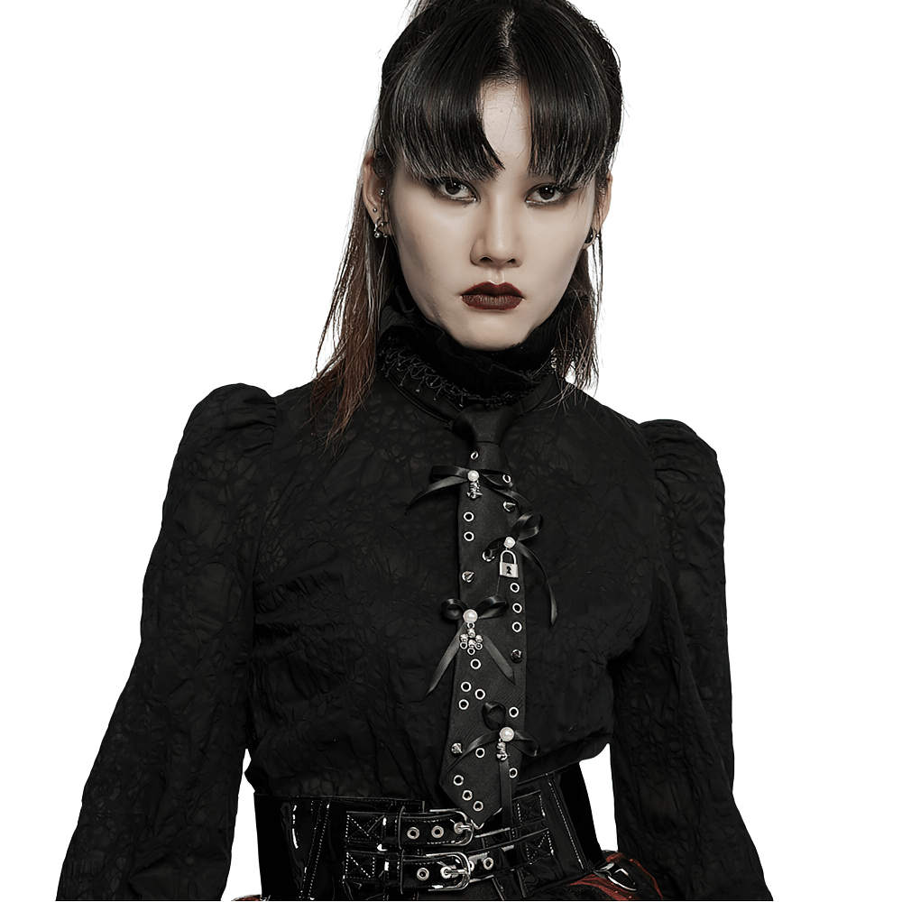 Gothic lace tie with skull and lock charms, styled in chic punk fashion, featuring a model in a dramatic black outfit.