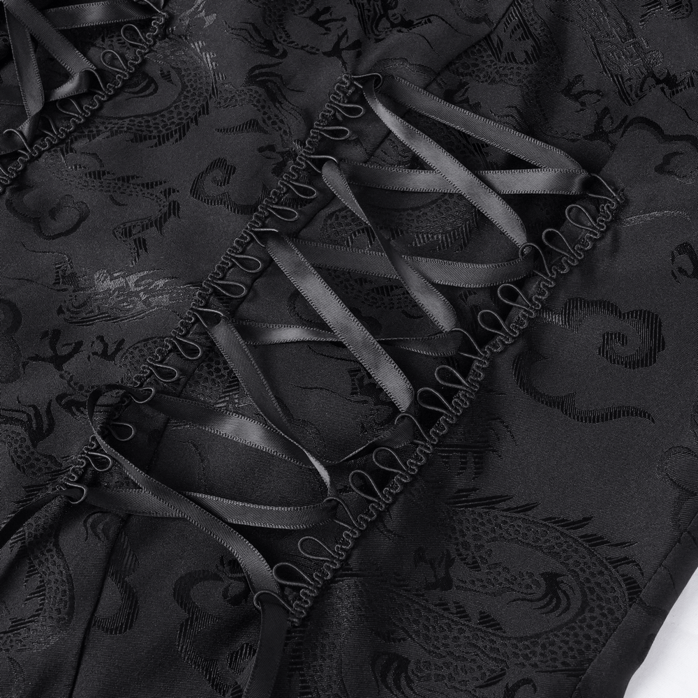 Intricate lace-up detail on a dark Gothic dress, showcasing elegant black ribbons and intricate fabric patterns.