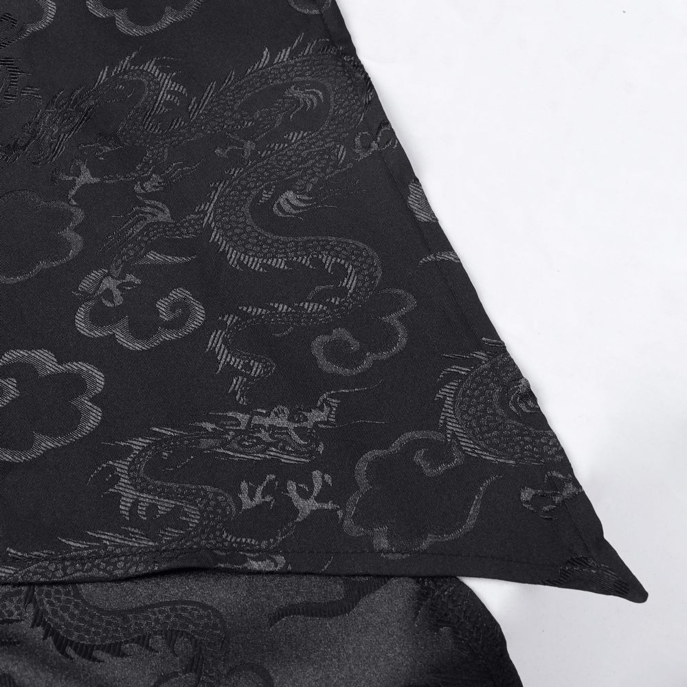 Black fabric with intricate dragon and cloud patterns, showcasing elegant texture and design details.