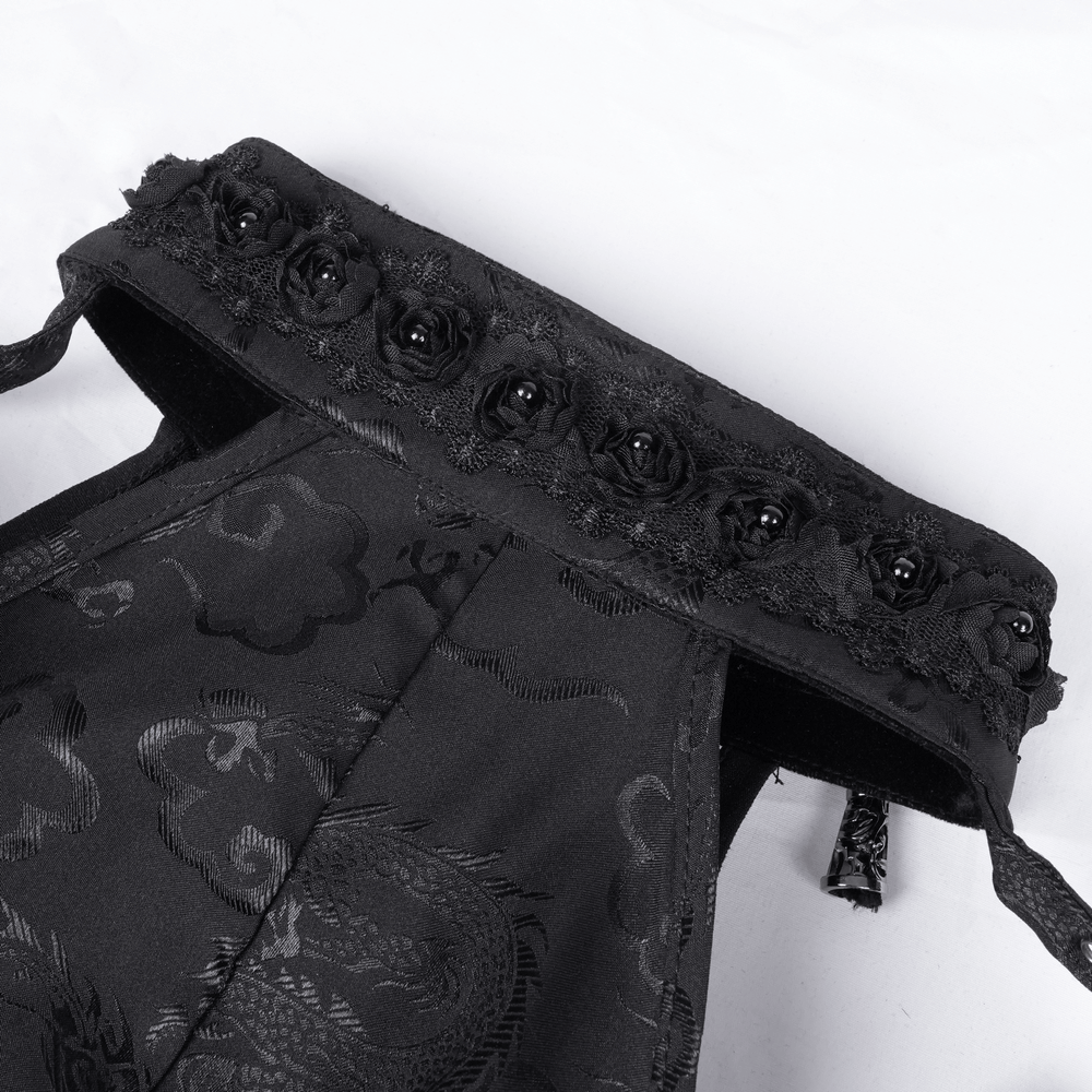 Close-up of gothic dress detailing with black lace and rose appliques on the neckline, showcasing Victorian elegance.