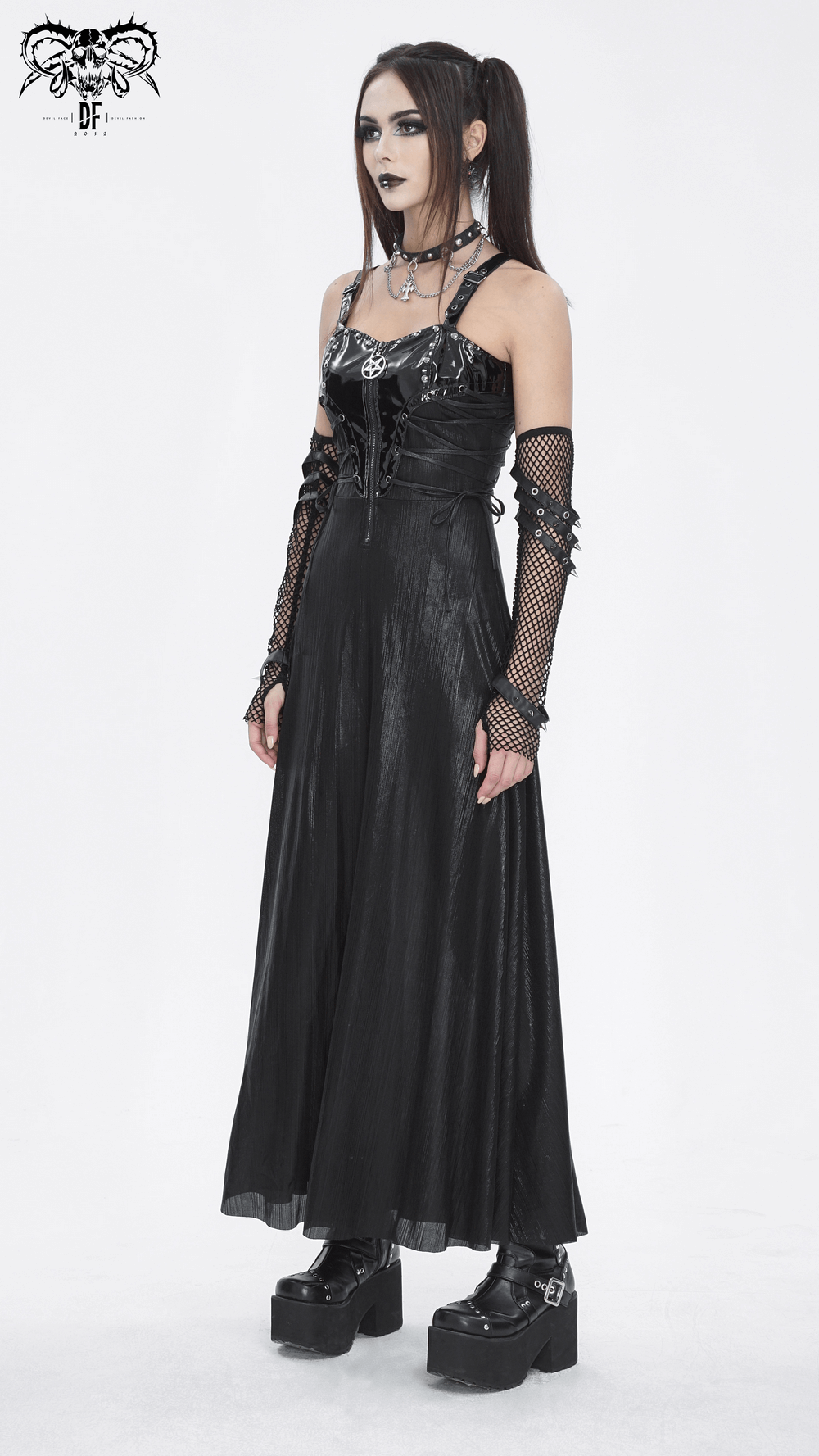 Elegant gothic lace-up back dress model with adjustable straps, corset detailing, and dark accessories.