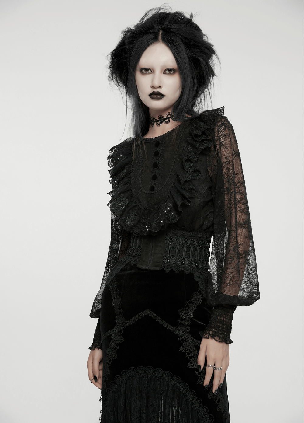 Gothic model in lace blouse and corset belt, embodying Victorian elegance with dark makeup and intricate details.