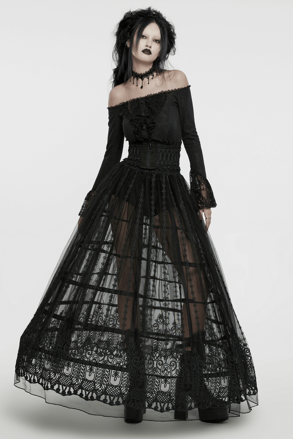 Gothic off-shoulder black dress with lace detailing and layered tulle skirt, embodying dark elegance.