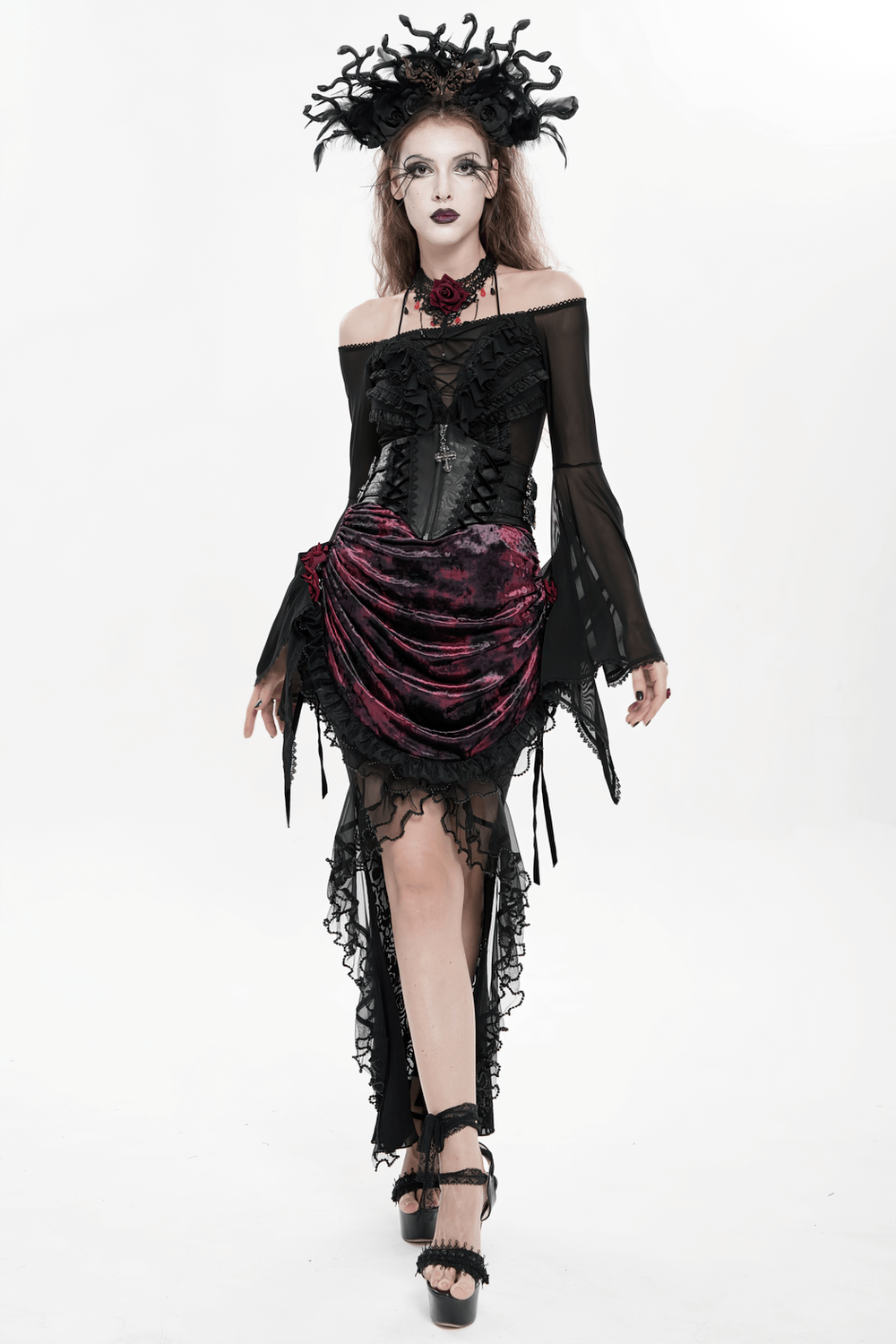 Gothic Lace-Up Black Corset Waist Belt with Cross Details worn in a dramatic fashion look.