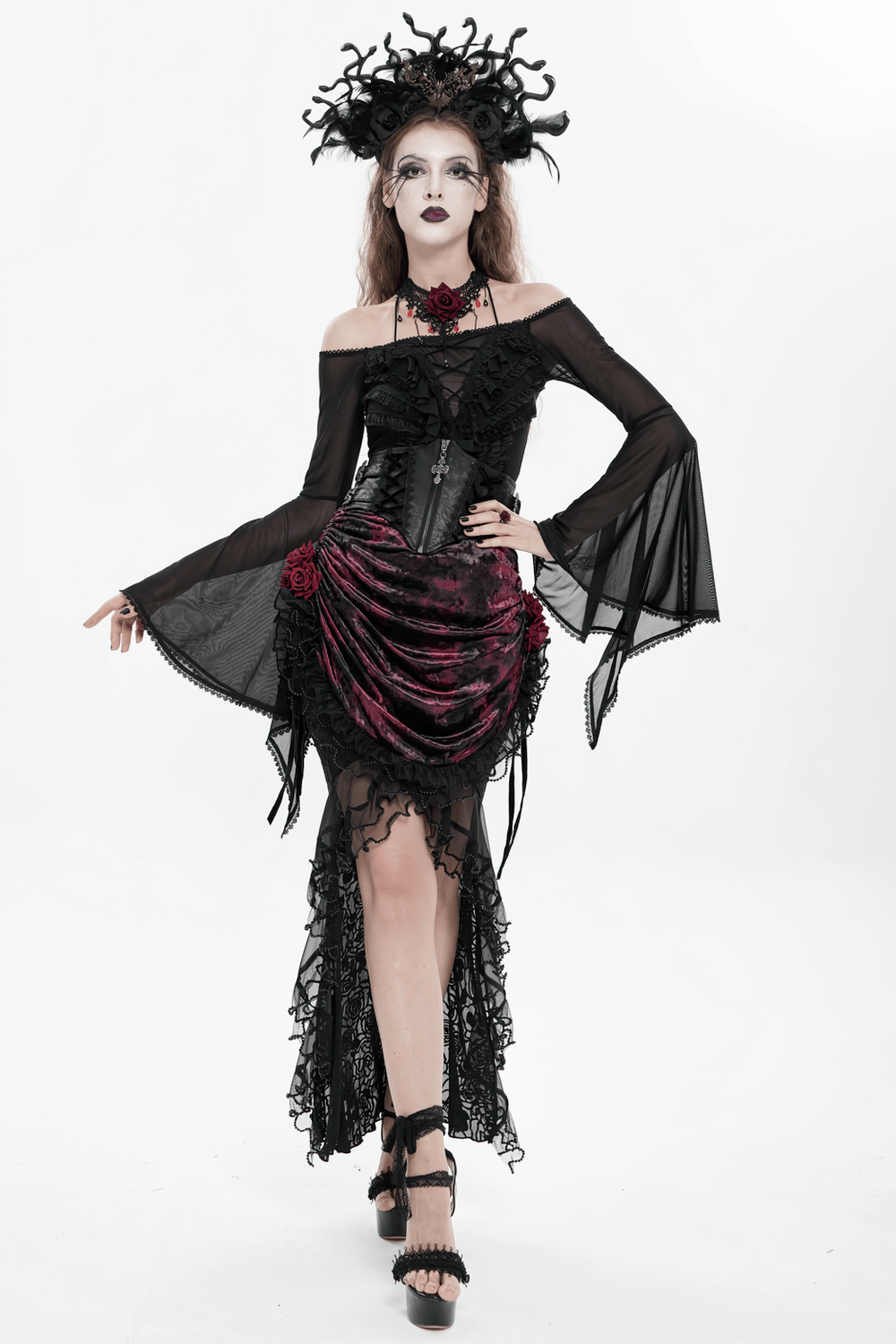 Gothic Lace-Up Black Corset Waist Belt with Cross Details worn by a model in a dark, elegant gothic outfit.