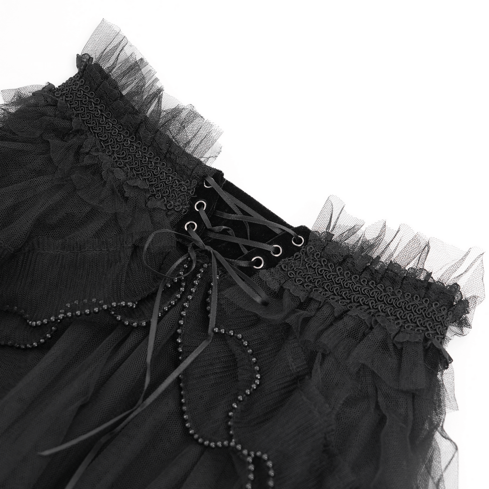 Gothic lace-up black ruffled shorts with tie detail and beaded embellishments.