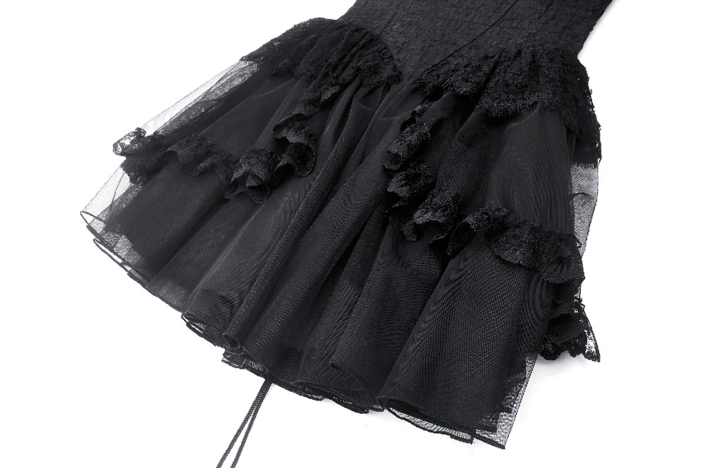 Elegant black tulle dress with lace accents and ruffled hem, perfect for gothic themed events.