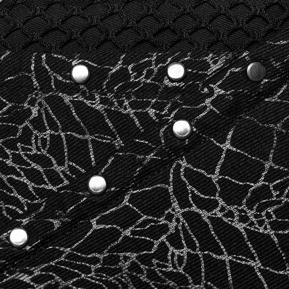 Close-up of gothic black twill fabric with mesh and rivets, showcasing edgy punk design and detailing.