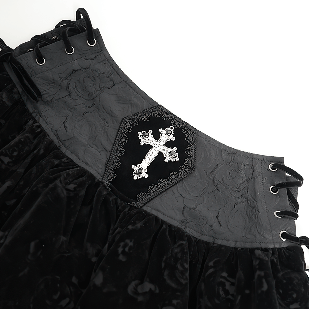 Gothic lace-up black velvet skirt featuring embroidered cross and tassel hem, perfect for Victorian-inspired fashion.