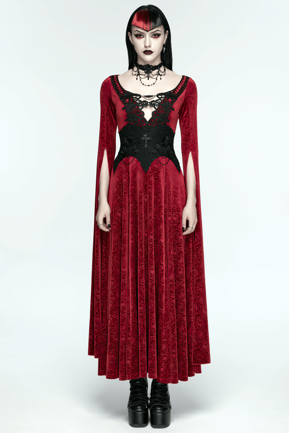 Gothic Lace-Up Corset Belt with Embroidery and Cross Details on model wearing a stunningly elegant red and black dress.