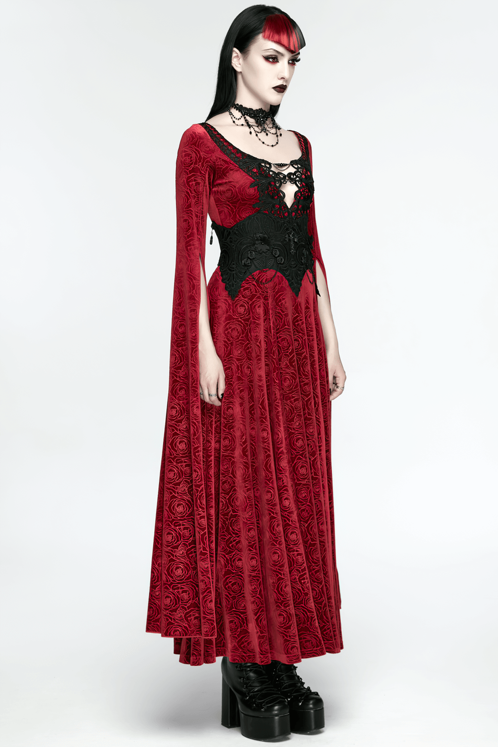 Gothic Lace-Up Corset Belt with Embroidery and Cross Details worn with a long red velvet dress and lace accents.