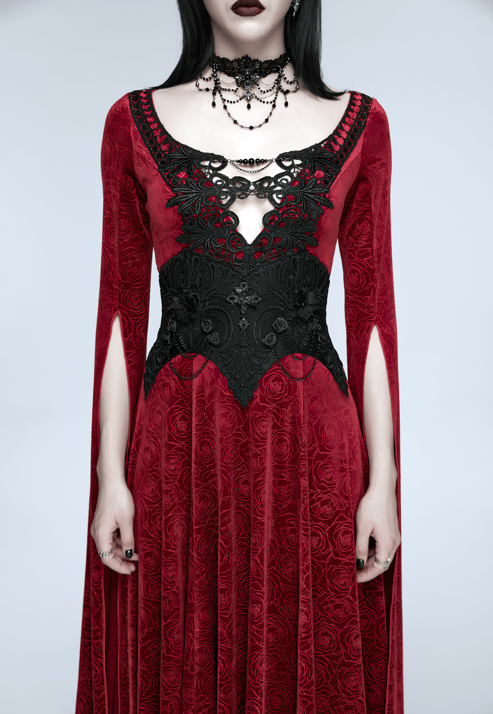 Gothic Lace-Up Corset Belt with Embroidery and Cross Details featured in a stunning red velvet dress.