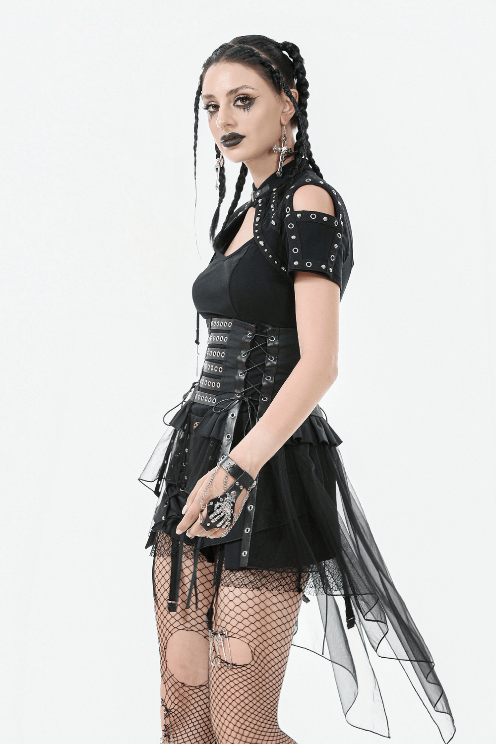 Gothic lace-up corset belt with layered tulle skirt, showcasing edgy fashion style and dramatic layers.