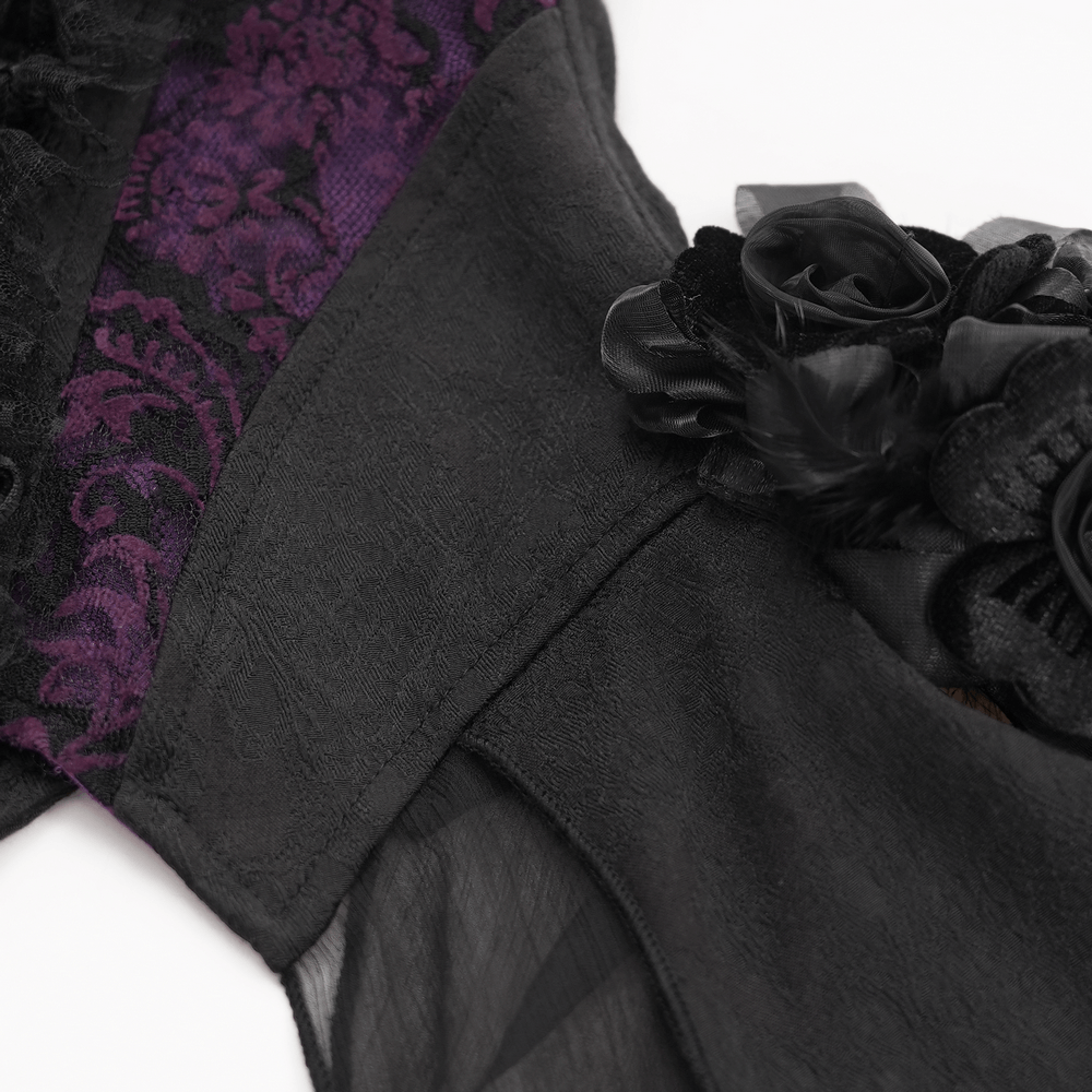 Close-up of Gothic lace-up corset top showcasing intricate black floral accents and rich purple detailing.