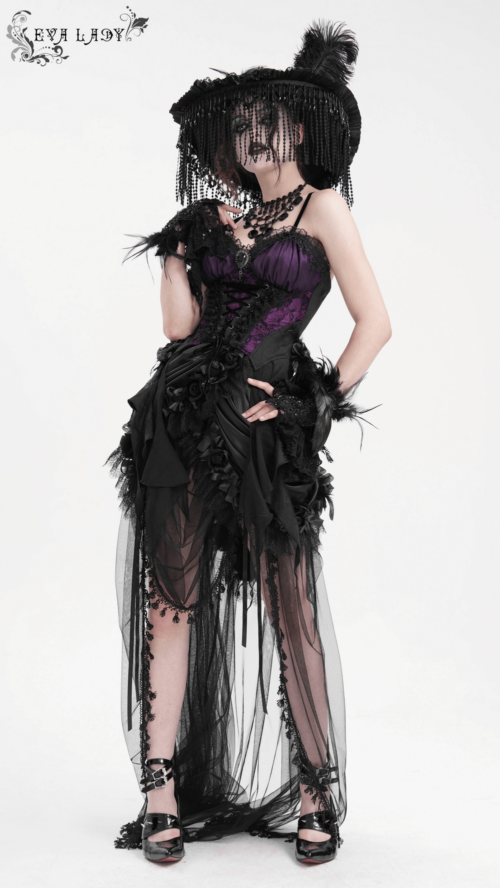 Elegant model in gothic lace-up corset top with floral accents, showcasing Victorian-inspired purple and black design.