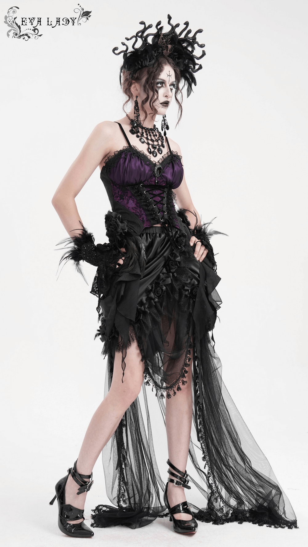 Gothic lace-up corset top with purple and black floral accents, showcasing Victorian elegance and dramatic style.