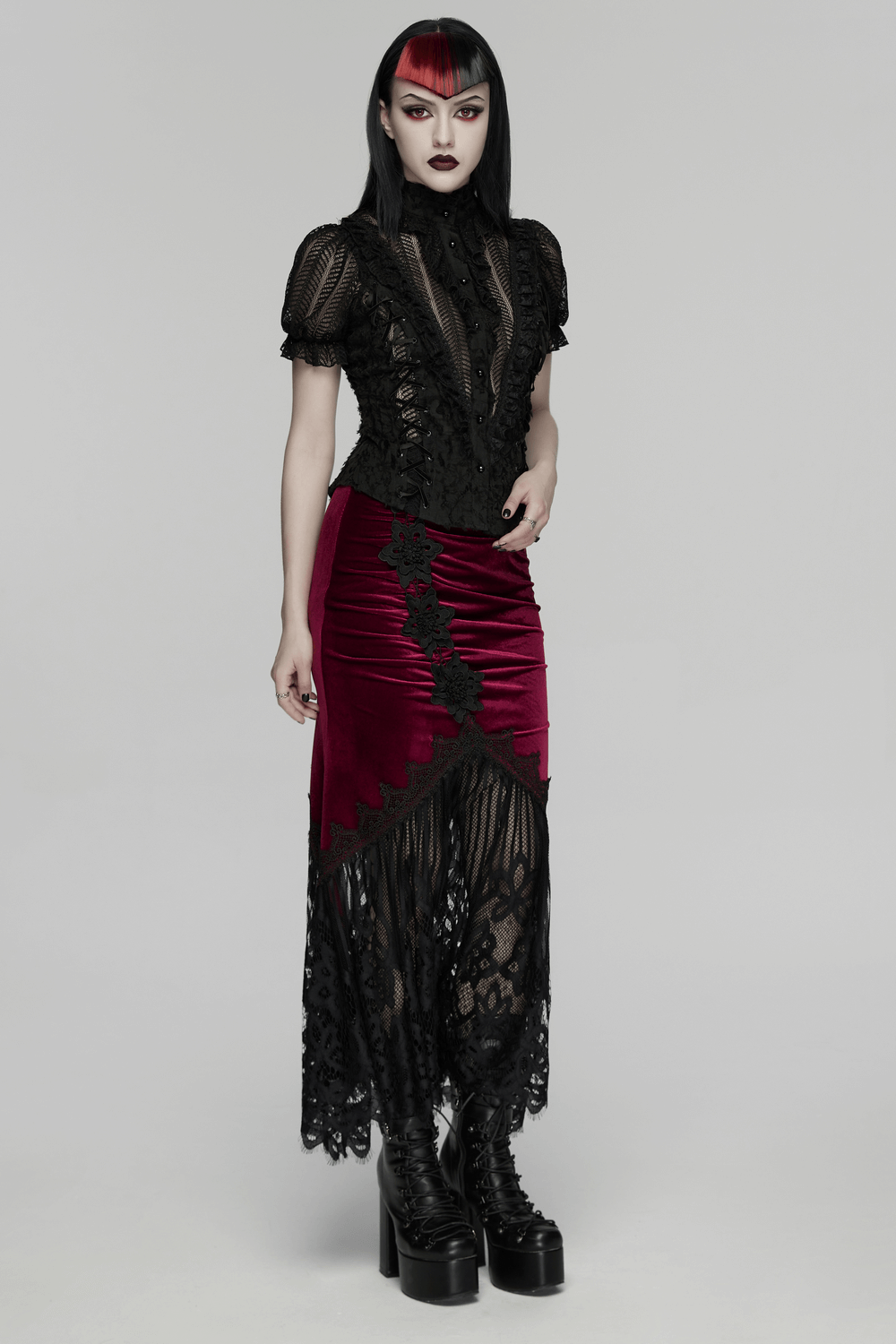 Gothic Lace-Up Decadent Shirt with Bubble Sleeves worn by a model with a dramatic gothic look.