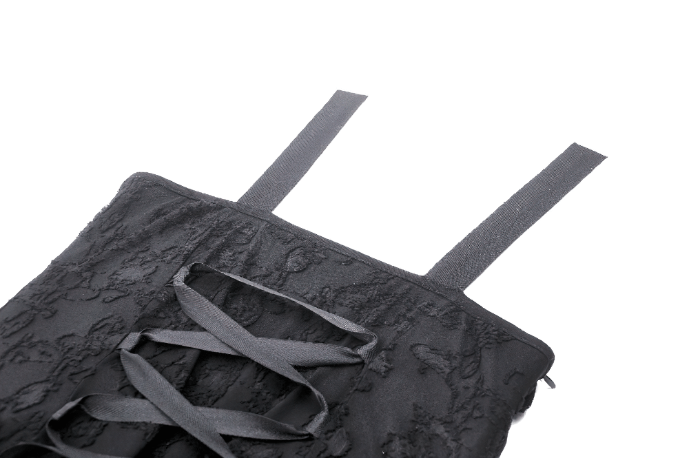 Close-up of Gothic lace-up dress straps with intricate lace details and unique ruffle neckline, perfect for alternative fashion.