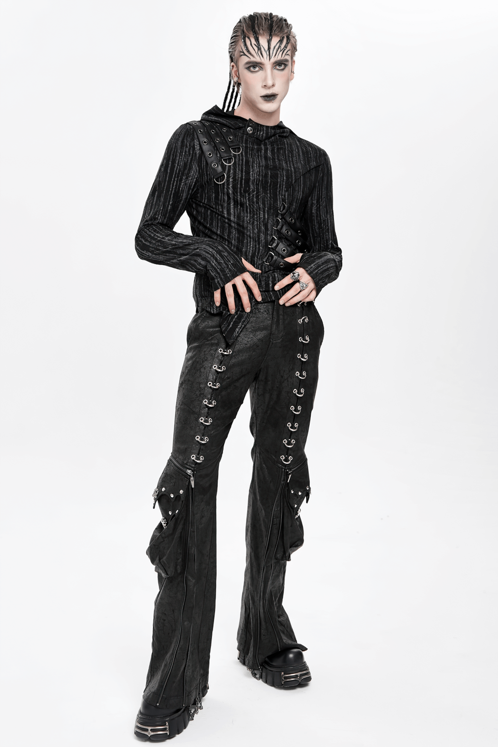 Gothic Lace Up Flared Pants with Metal Eyelet Details worn by model, featuring dramatic lace-up design and flared legs.