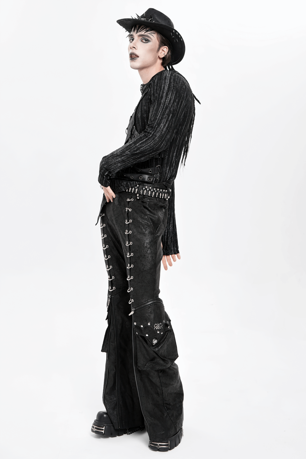 Gothic Lace Up Flared Pants with Metal Eyelet Details worn with a fringed black top and cowboy hat, showcasing edgy fashion.