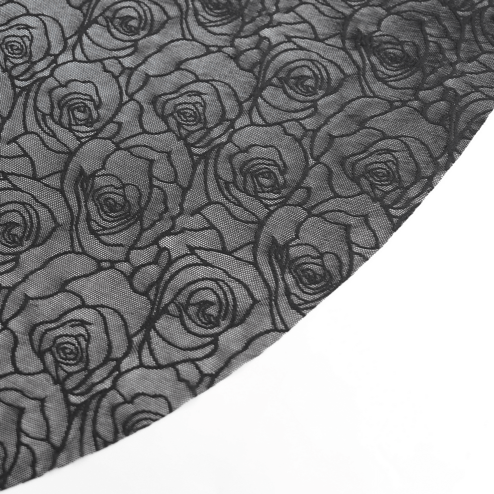 Close-up of black lace fabric featuring intricate rose floral patterns, perfect for gothic and romantic styles.