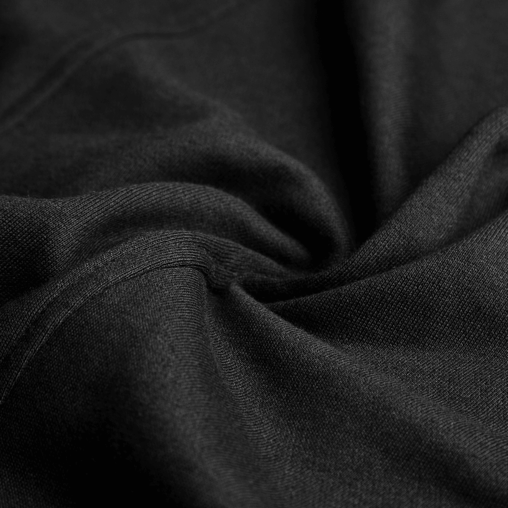 Close-up of smooth black knitted fabric showcasing texture and quality for gothic-style clothing.