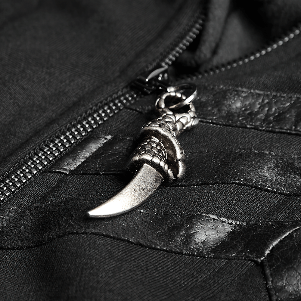 Close-up of a gothic coat's zipper pull featuring a faux dagger charm, adding edgy detail to the design.