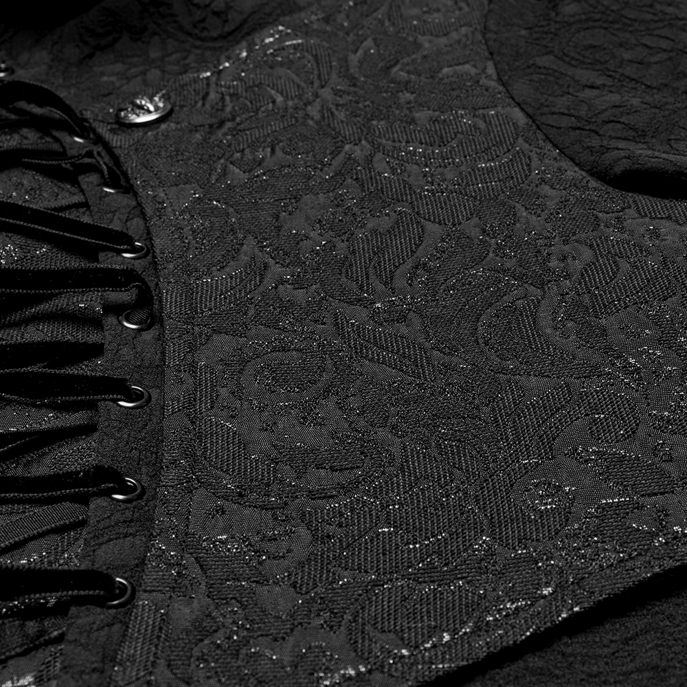 Close-up of Gothic lace-up shirt featuring intricate brocade design and dark, textured fabric details.