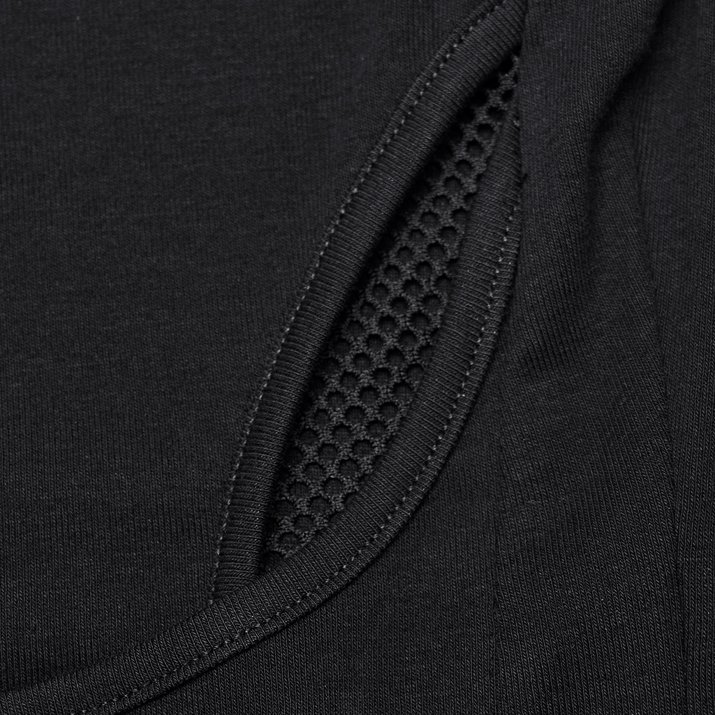 Close-up of black gothic lace-up top fabric showing mesh detail and structured waist design.