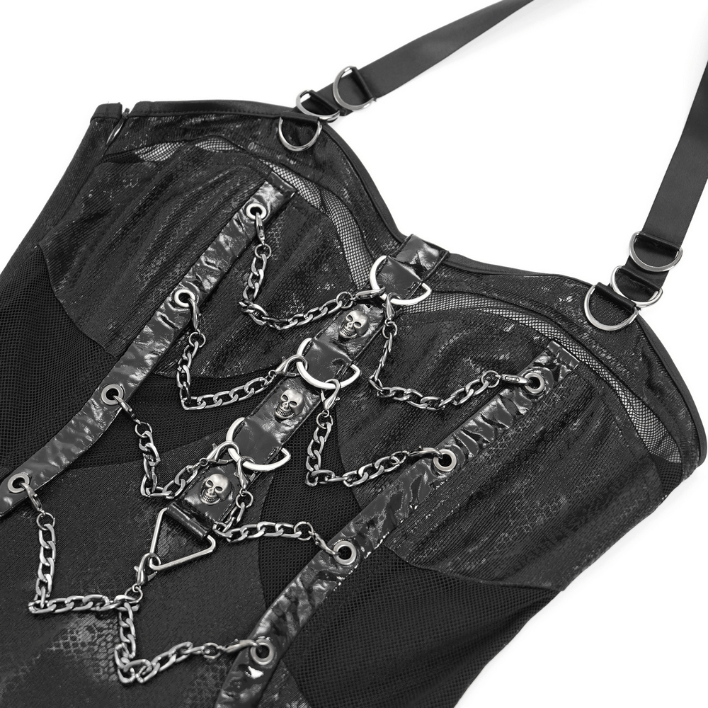 Close-up of gothic lace-up dress featuring chains and skull embellishments on a textured black fabric.