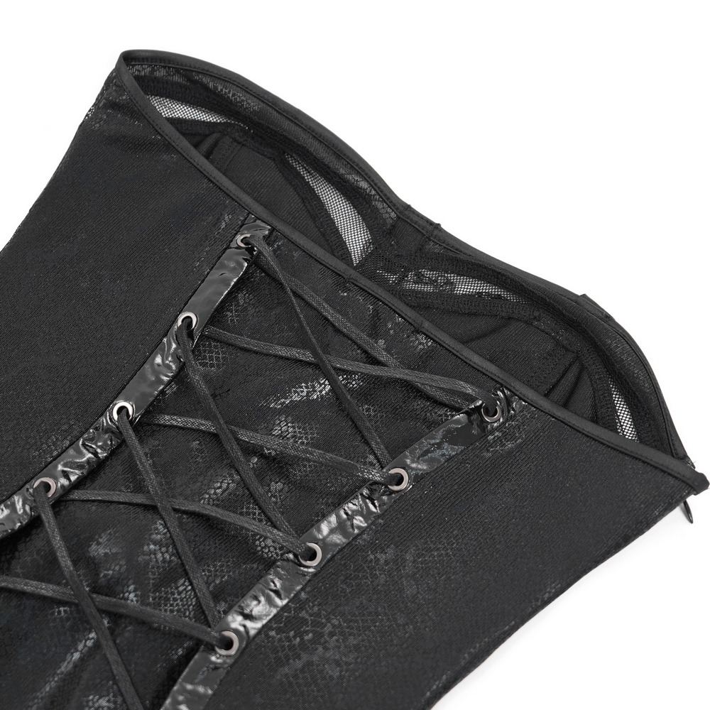 Close-up of lace-up corset back detail on a gothic maxi dress, featuring black fabric and mesh accents.