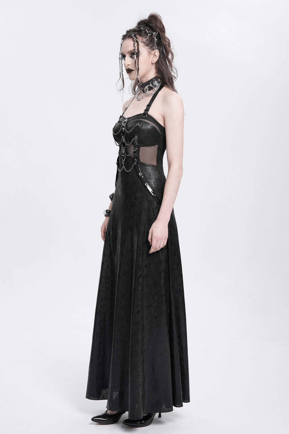 Gothic lace-up maxi dress in black with chain details and cutouts, perfect for dark aesthetic lovers.