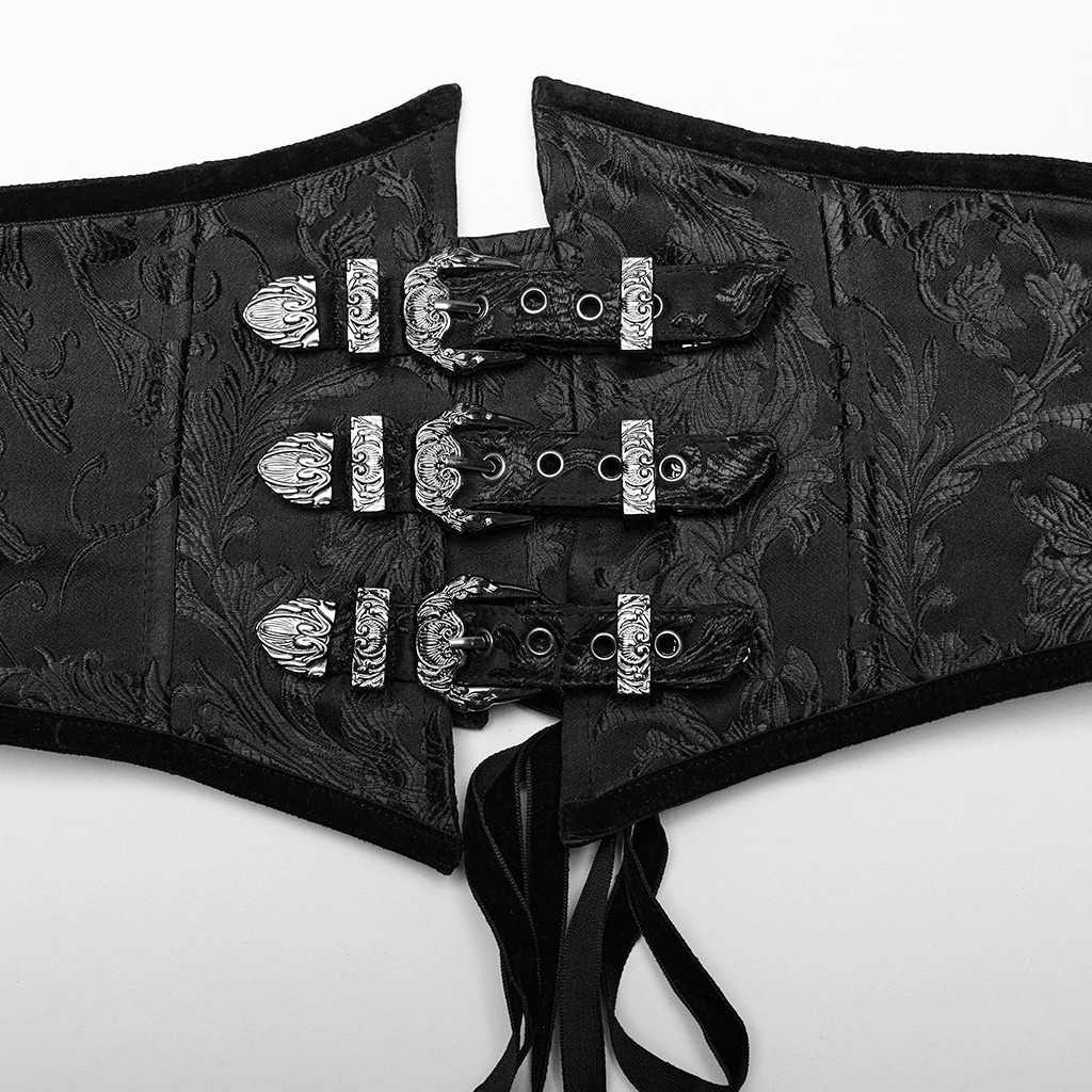 Close-up of Gothic lace-up black mesh corset with ornate metal buckles and intricate fabric details.