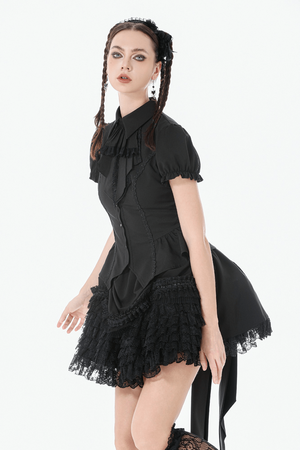 Gothic Lace-up Puff Sleeve Waist-Shaping Shirt with Bow Tie worn by a model, showcasing intricate lace and puff sleeves.